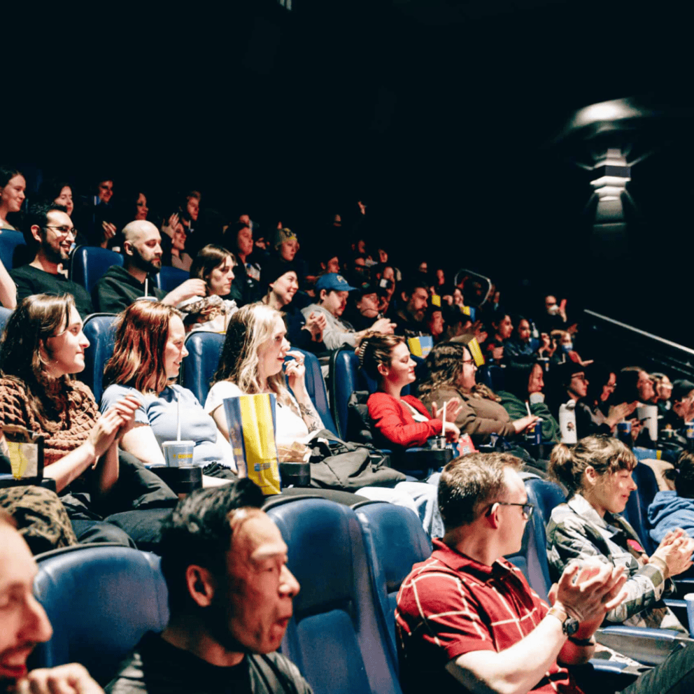 Crowd of people at Ginger Snaps film screening in Toronto on National Canadian Film Day.